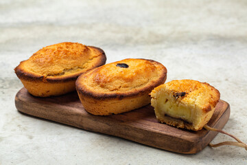 A Pasticciotto, small Italian cake, filled  with egg custard cream. Called also pusties....
