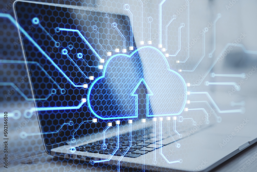 Aufkleber Cloud and internet information storage concept with digital cloud icon with arrow up with microcircuit lines on laptop background