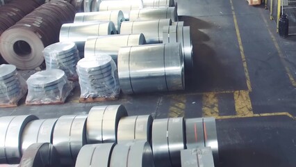 Rolled steel coil, metal sheet storage in factory warehouse