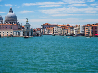 The grand canal in venice with car ferry in italy with cityscape view.