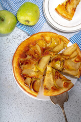Classic upside-down apple cake. Retro apple cake recipe, cooked in frying pan easy autumn summer homemade baking sweet pastry, with fresh green apples copy space