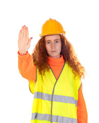 Portrait of attractive cheerful lucky red-haired girl with helmet and reflective vest