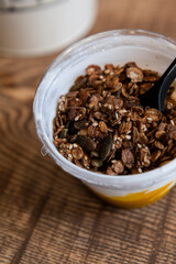 showing a fruit yoghurt with granola
