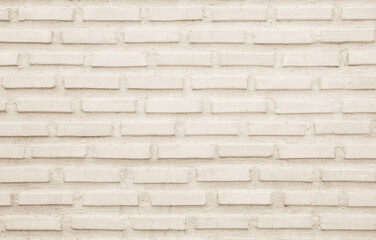 Cream and white brick wall texture background. Brickwork style vintage old pattern clean with concrete uneven color beige bricks stack decoration.