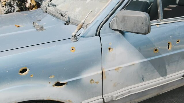 Irpin, a shot car after the war, the consequences of the invasion of Russian troops in Ukraine