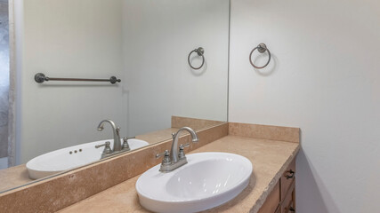 Panorama Bathroom interior with vanity sink and towel bar holder