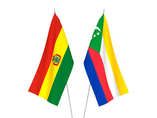 National fabric flags of Bolivia and Union of the Comoros isolated on white background. 3d rendering illustration.
