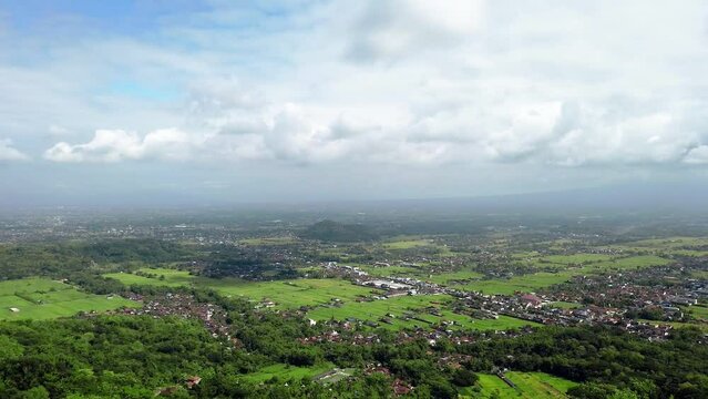 Aerial panoramic view of Yogyakarta Indonesia region of java island, agricultural landscape with farm and wild vegetation