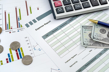 Paper chart diagram report with dollar bills. Business documents