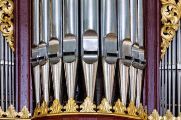 Old metal organ pipes in a church