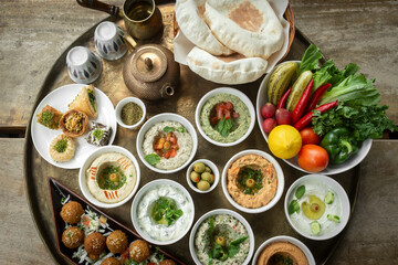 mixed middle eastern meze sharing food platter in turkish restaurant
