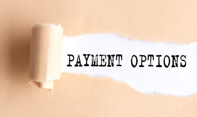 The text PAYMENT OPTIONS appears on torn paper on white background.