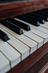 Fototapeta na wymiar Old piano keys Honky Tonk piano
