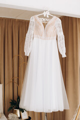wedding dress on hangers