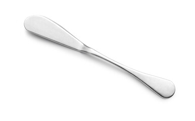 Knife spreads butter and jam on white background.