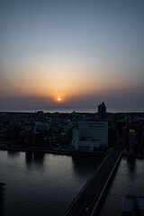 Obraz premium Sunset on the Sea of Japan seen from the window