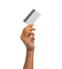 shopping, finance and people concept - close up of female hand with silver credit card over white...