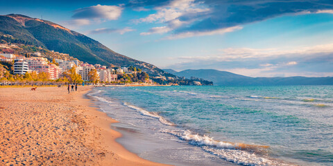 Sunny summer cityscape of Vlore town. Nice morning seascape of Adriatic sea. Splendid outdoor scene of Albania, Europe. Traveling concept background. - obrazy, fototapety, plakaty