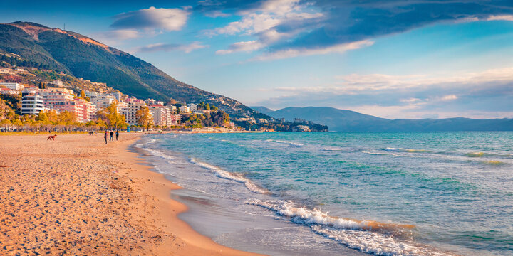 Sunny summer cityscape of Vlore town. Nice morning seascape of Adriatic sea. Splendid outdoor scene of Albania, Europe. Traveling concept background.