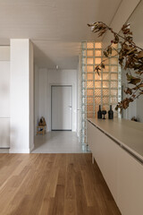 modern loft style apartment, living room in modern studio apartment, glass blocks in the loft interior