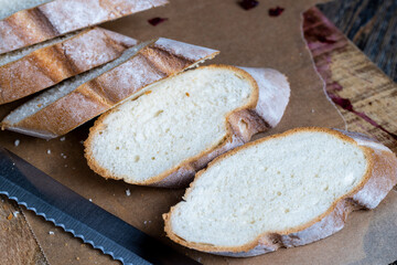 cut fresh wheat baguette into several pieces
