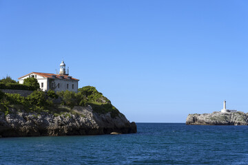 View of Santander bay lighthouses, La Magdalena Peninsula lighthouse and Mouro island lighthouse, Santander Bay, cultural heritage, Spain