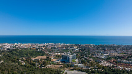 Fototapeta na wymiar vista del municipio de Marbella y el mar en un bonito día azul, España