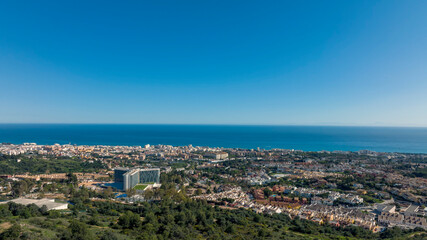 Fototapeta na wymiar vista del municipio de Marbella y el mar en un bonito día azul, España