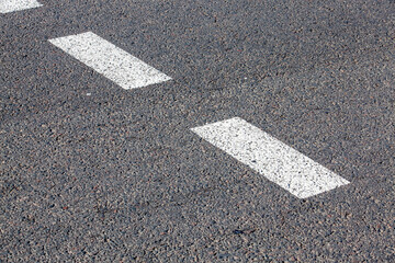 old road markings on a motorway