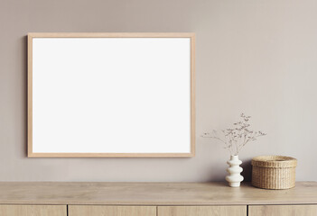 Blank picture frame mockup on gray wall. White living room design. View of modern scandinavian...
