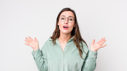 young pretty woman feeling puzzled and confused, unsure about the correct answer or decision,...