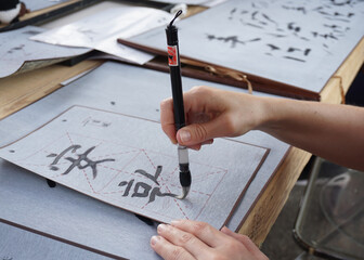 Study of hieroglyphs, shodo Japanese calligraphy brush writing process learning