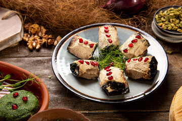 Georgian eggplant appetizer badrijani portion on the table