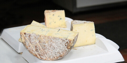 A Display of Some Large Pieces of Blue Cheese.
