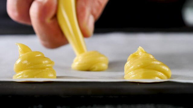 chef cooking choux dough, profiterole