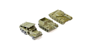 World war II toy tank, armored personnel carriers are isolate on white background. Retro model of military equipment. Guards mortar.
