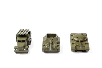 World war II toy tank, armored personnel carriers are isolate on white background. Retro model of...