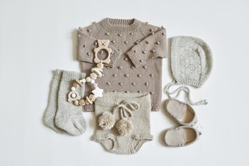 Children's knitwear. Jumper, hat, booties, socks. Wooden teether, nipple. Baby shower party....