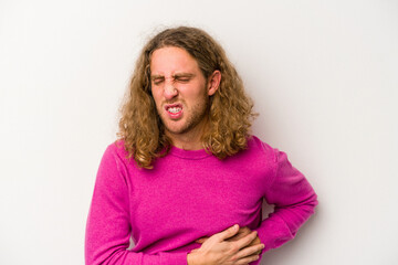 Young caucasian man isolated on white background having a liver pain, stomach ache.