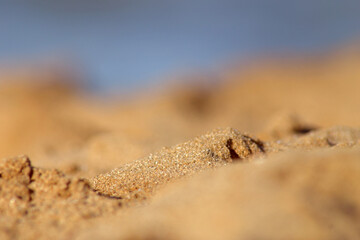 Summer vacation adventure and vacation travel freedom concept. Abstract blur blurred background, nature of tropical summer beach. Soft and blurry tropical beach. Golden sand beach. Summer outdoor vaca