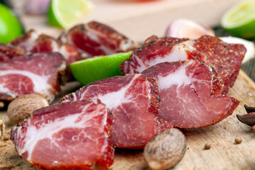 pork and bacon sliced during cooking