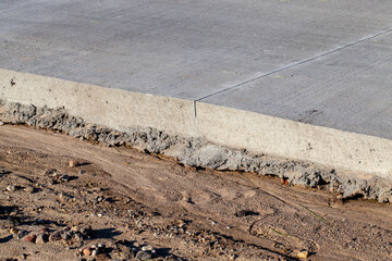 a thick layer of a new road made and built of concrete slabs