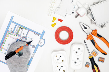 electrician checking electrical scheme in house. repair concept.