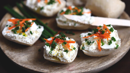 Canape with cream cheese and green onions. Healthy sandwich.