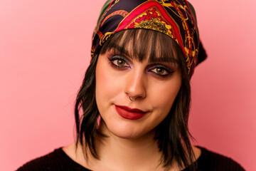 Young caucasian makeup artist woman isolated on pink background