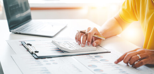 The financiers are calculating personal taxes for their customers..