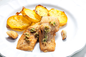 salmon fillet with garlic pesto and fried potatoes