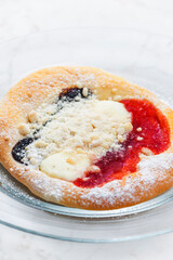 pie stuffed with curd, poppy and strawberry marmelade