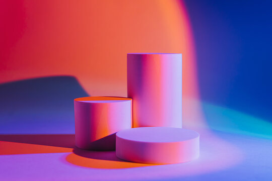 Abstract background with podiums in neon light for product presentation. Stylish geometric shapes to show  products.
