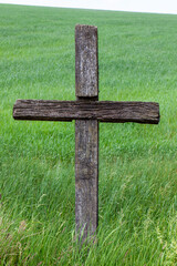 religious catholic cross made of wood in nature